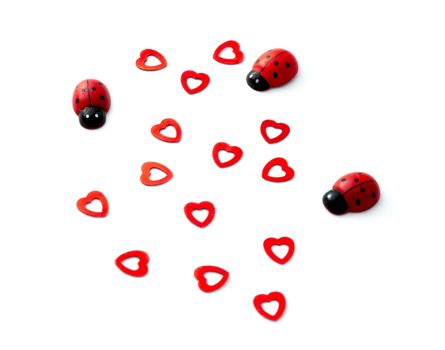 Red hearts and ladybugs for Valentines day concept
