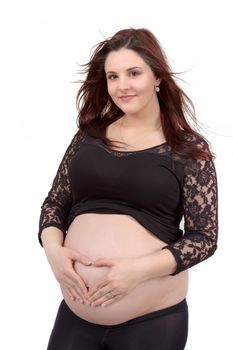 beautiful smiling pregnant woman tenderly holding her tummy isolated on white background