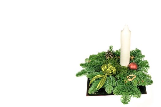 Beautiful christmas decoration with pine twigs and a candle