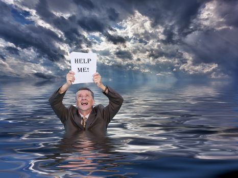 Conceptual image of senior businessman in suit up to waist in deep water worried about drowning in paperwork and holding help me document. Stormy clouds behind reflect in the ocean.