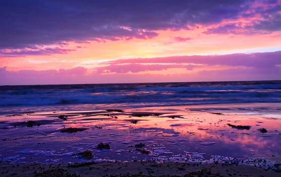 Beautiful beach sunrise at The Entrance, south side, Central Coast, Australia.  Motion blur in water.