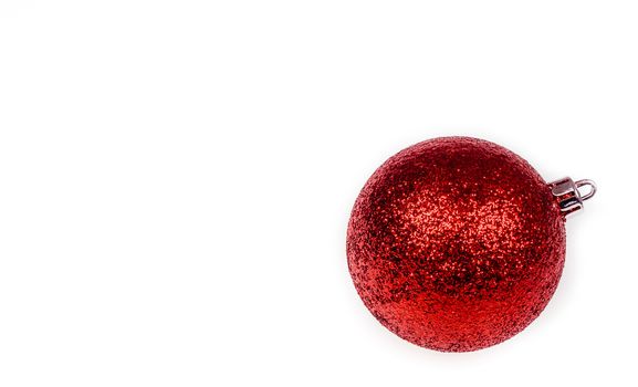 Red christmas glass bauble isolated on white