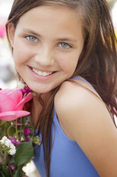 Pretty Young Girl Holding A Flower Bouquet at the Street Market.