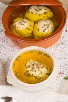 Festive soup with matza ball dumplings, traditional Jewish cuisine