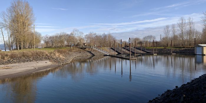 Boat launch wooden platforms and steel beams panoramic view Oregon.