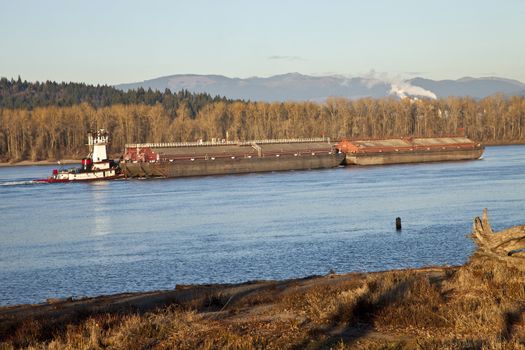 Push boat and barges nautical transportation Columbia river Oregon.