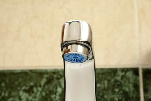 Silver Water Tap in the Bathroom