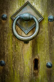 Handle And Keyhole Of Closed And Locked Ancient Wooden Church Door