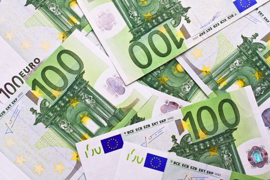 Many euro banknotes making european currency background