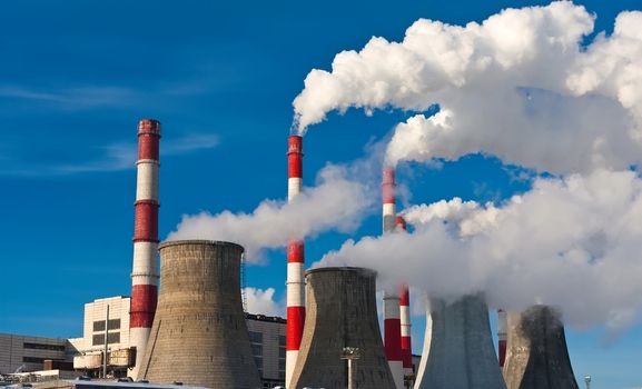 Industrial smoke rising from Power Station Cooling Towers