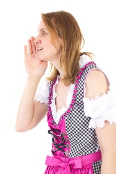 Woman wearing dirndl is whispering to her friend