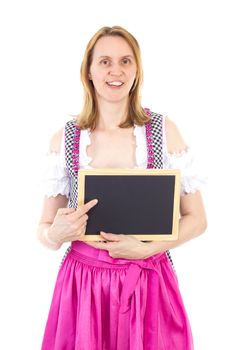 Bavarian woman pointing to clean blackboard