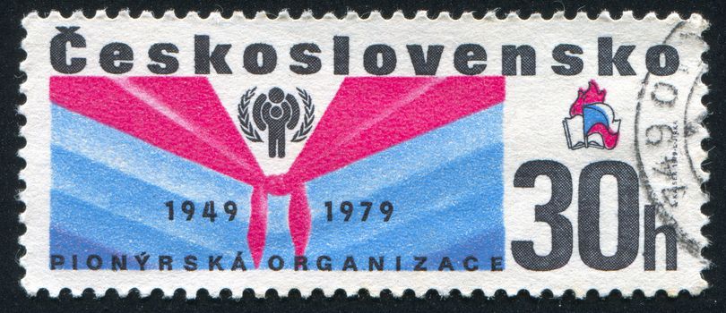 CZECHOSLOVAKIA - CIRCA 1979: stamp printed by Czechoslovakia, shows Pioneer Scarf, IYC Emblem, circa 1979