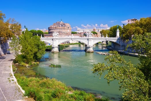 Famous Saint Angel castle and bridge over Tiber river in Rome, Italy