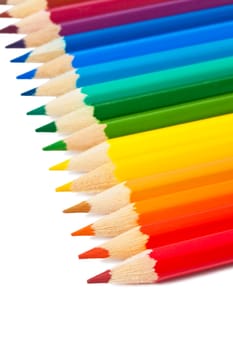 Close up photo of colour pencils isolated on white background