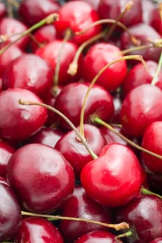 Beautiful red fresh cherry macro photo background