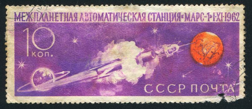 RUSSIA - CIRCA 1962: stamp printed by Russia, shows Space Rocket, Earth and Mars, circa 1962