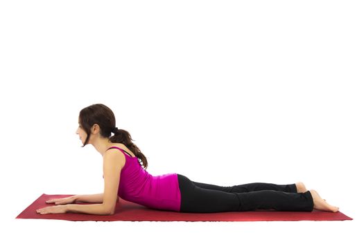 Young woman doing Sphinx Pose in Yoga (Series with the same model available