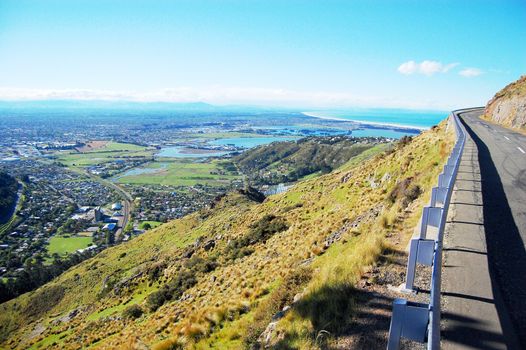 Mountain road turning right town and sea view, Christchurch, New Zealand