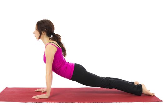 Young woman doing Upward Facing Dog in Yoga (Series with the same model available