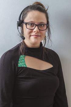 thirty something phone agent with headset with great big smile