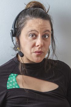 thirty something phone agent with headset with oh face