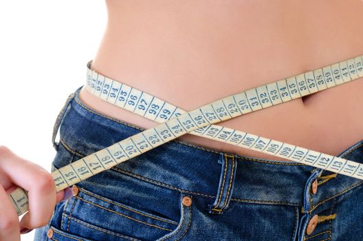 Close-up of Girl Measure the Waist, Centimeters Tape, Horizontal shot over White Background 