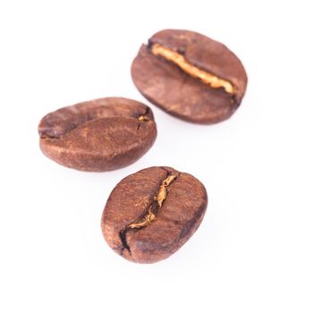 three coffe beans isolated on white background