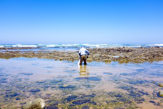 Fisherman fishing on crab at the atlantic ocean