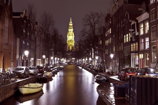 City scenic from Amsterdam in the Netherlands with the Zuiderkerk at night