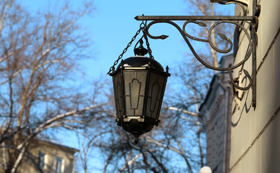 Ancient lantern on the wall