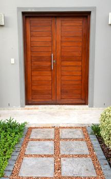 A conceptual shot of a front household wooden door