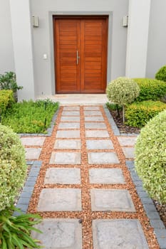 A conceptual shot of a front household wooden door