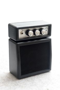 An amplifier isolated against a plain backgrouns
