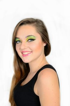 Close up portrait of young female model with blond hairs. Teenager from Poland, smiling face and colorful makeup.