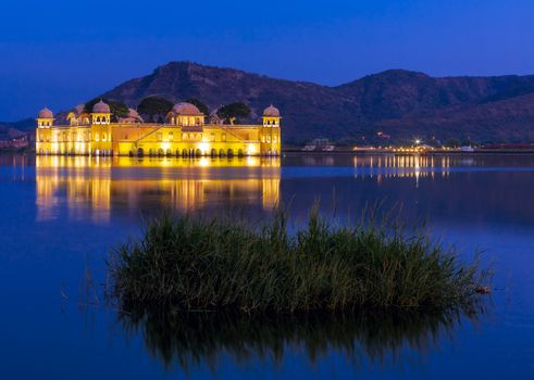 The palace Jal Mahal at night. Jal Mahal (Water Palace) was built during the 18th century in the middle of Man Sager Lake. Jaipur, Rajasthan, India, Asia