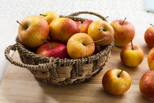 Basket of yellow and red apples