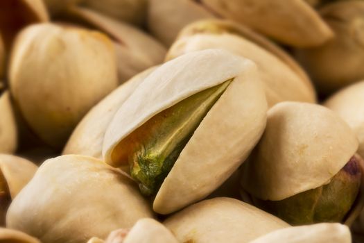 Close up of a pistachio nut in a group