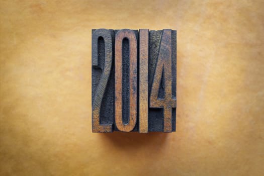 The year 2014 written in vintage letterpress letters.