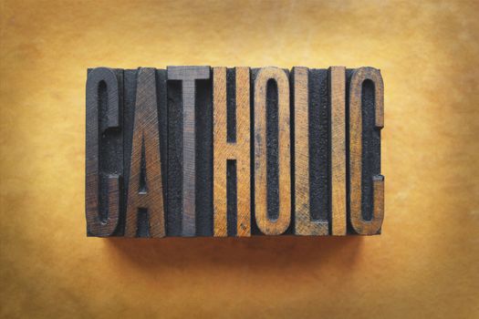 The word CATHOLIC written in vintage letterpress type