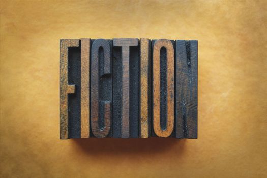 The word FICTION written in vintage letterpress type.