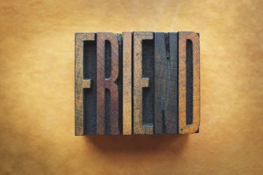 The word FRIEND written in vintage letterpress type.