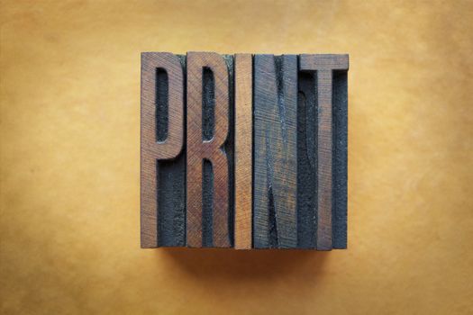 The word PRINT written in vintage letterpress type
