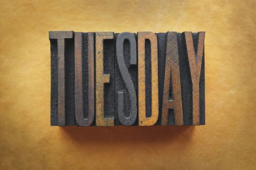 The word TUESDAY written in vintage letterpress type.