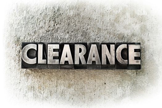The word "CLEARANCE" written in old vintage letterpress type.