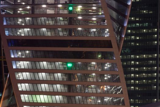 Elements if skyscraper under construction at night