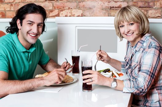 Young couple having dinner at a restaurant