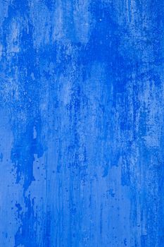 A blue grunge texture with other colors inside