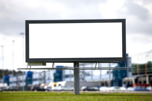 Blank Large billboard against blurred shopping center for your advertisement