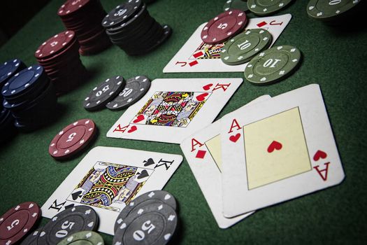 cards poker deck English, Poker game interesting with a possible winning combination on green background